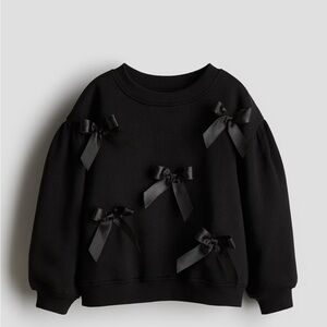 Black Sweatshirt with Bow Accents